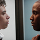 Anthony Ramos as Manny (L) and John David Washington as Officer Dennis Williams (R)